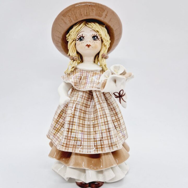 Blonde lady with a flower