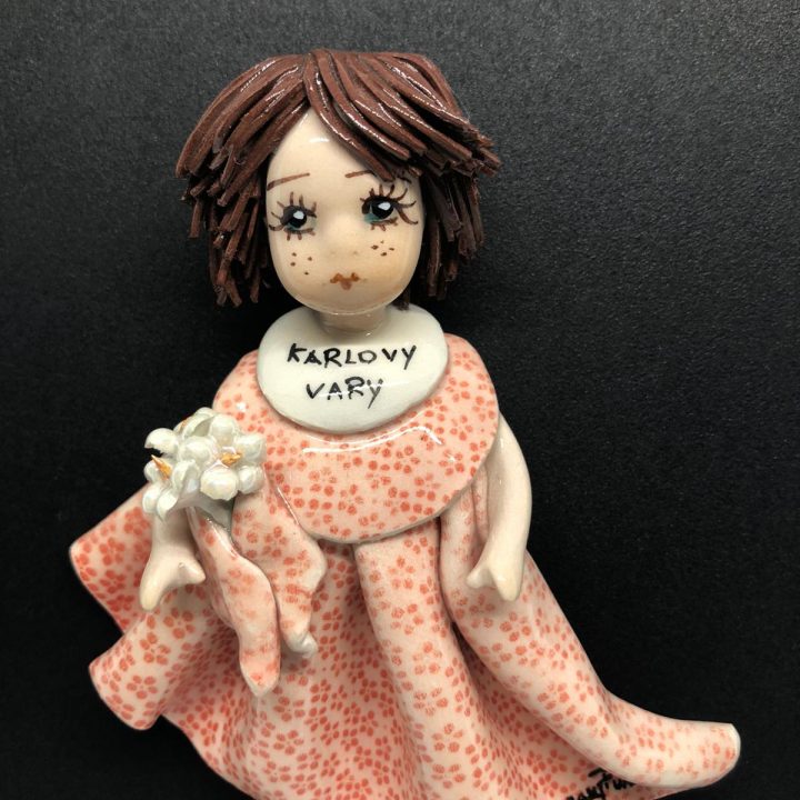 Porcelain doll magnet
