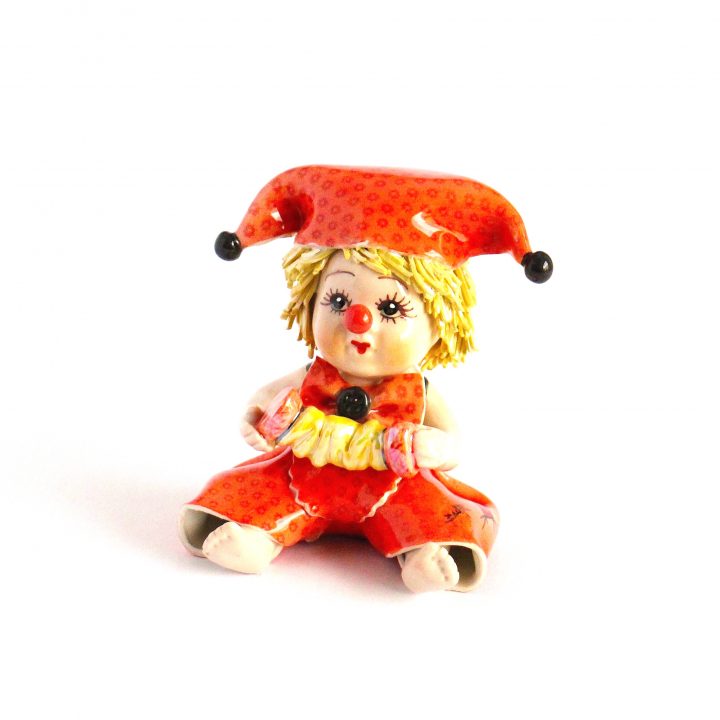 sitting clown musician