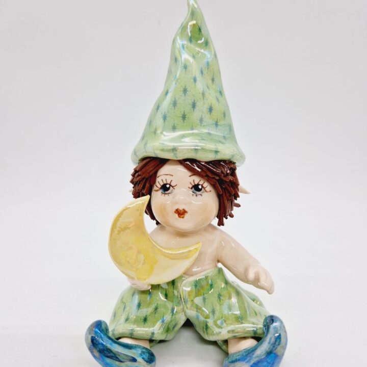 Elf holding the moon