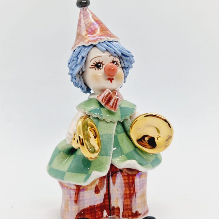 Clown with percussion instruments