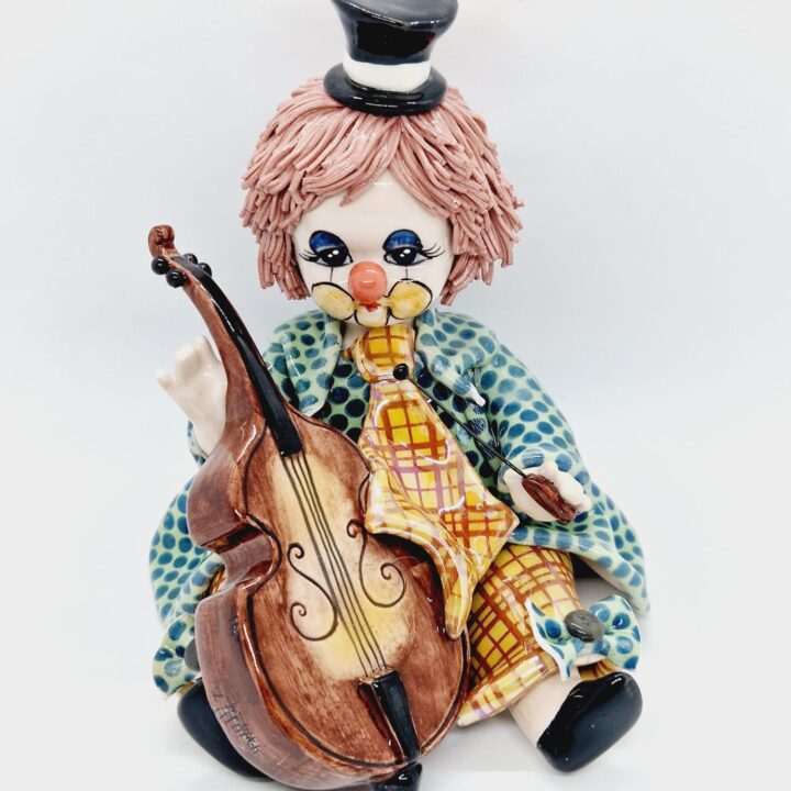Clown playing cello