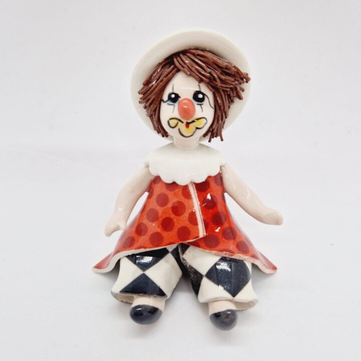 Sitting circus clown