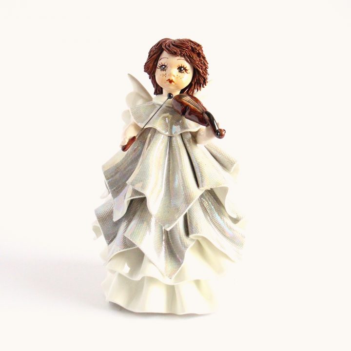 Standing angel playing violin