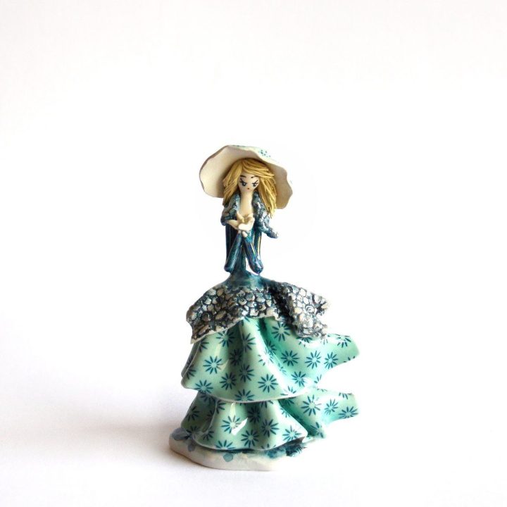 Lady with green flowers